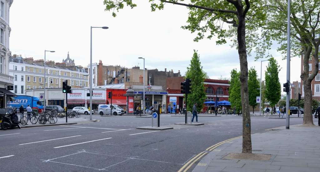 BEFORE: Current view from Old Brompton Road looking across South Ken Station (Rendered Image Ltd)