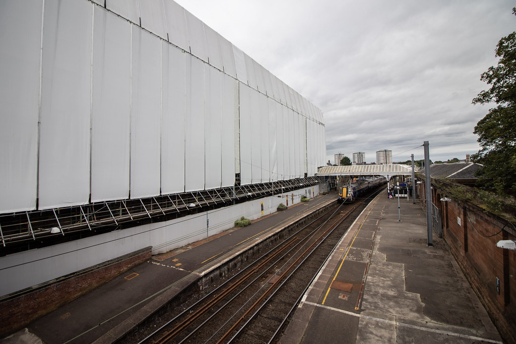 AFTER: The south wing today, covered by scaffolding costing £69k a month [Credit: ASHAG]